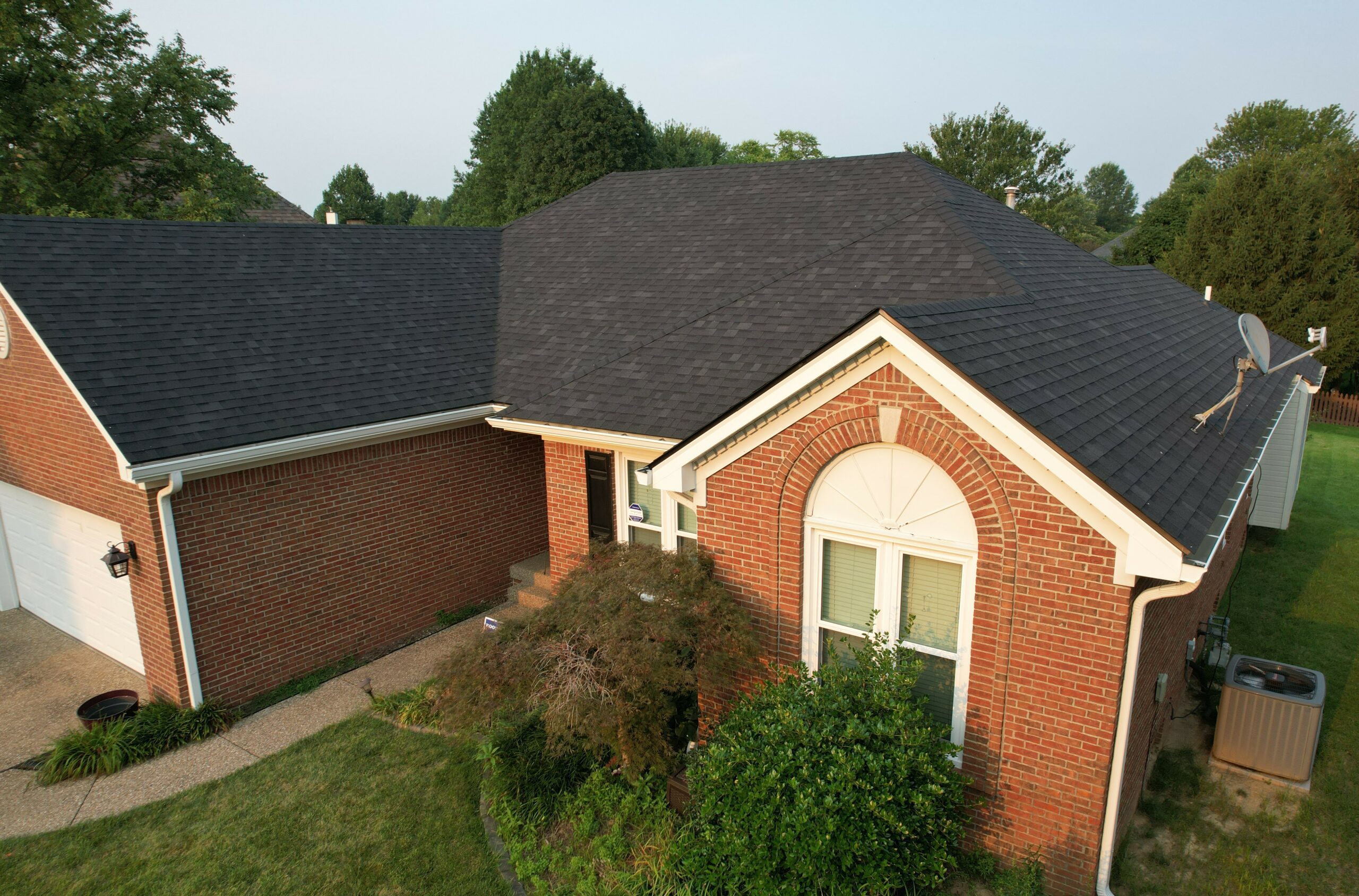 Roof repaired with black onyx shingles