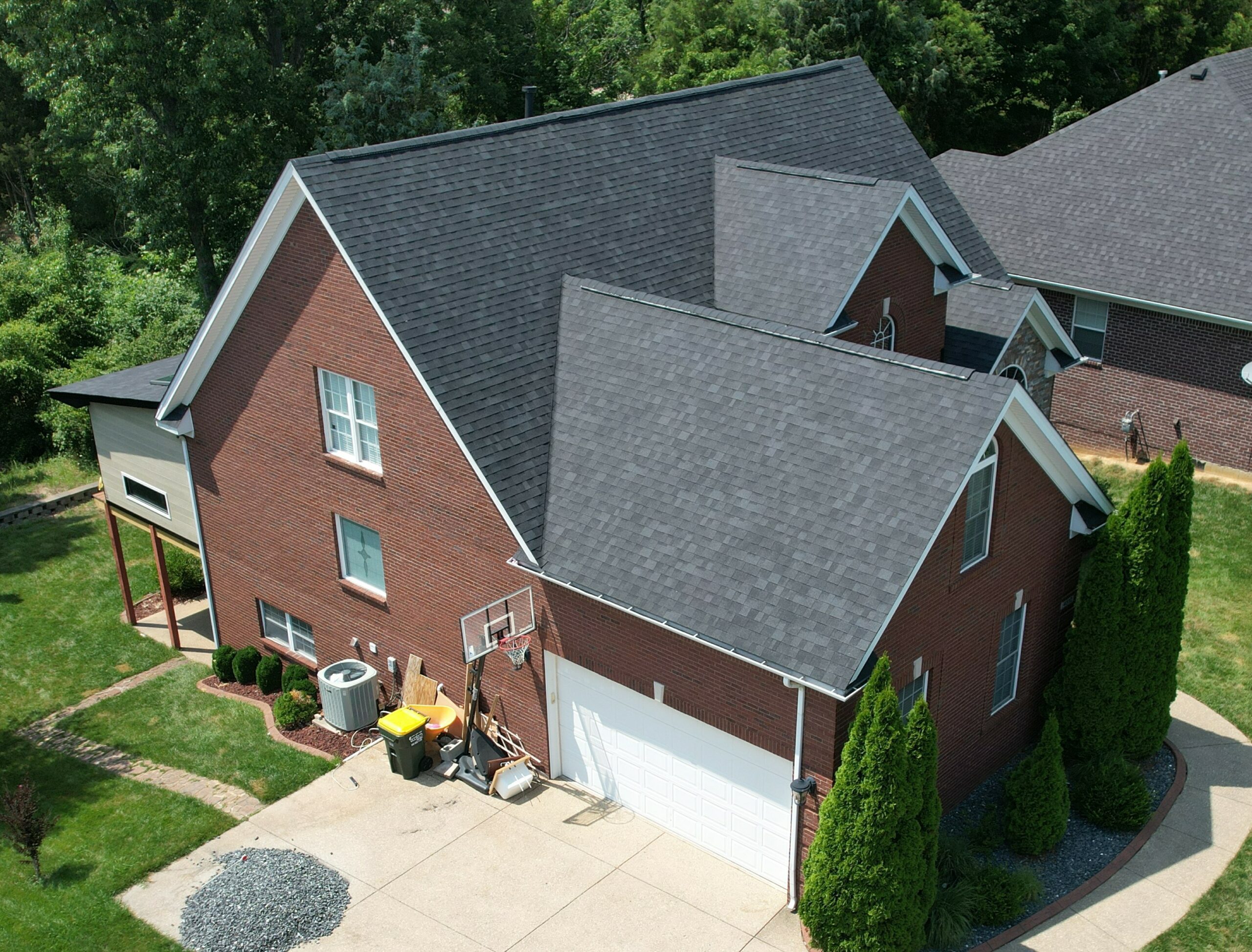 House with newly replaced onyx black shingles