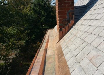 Copper gutters on a new roof