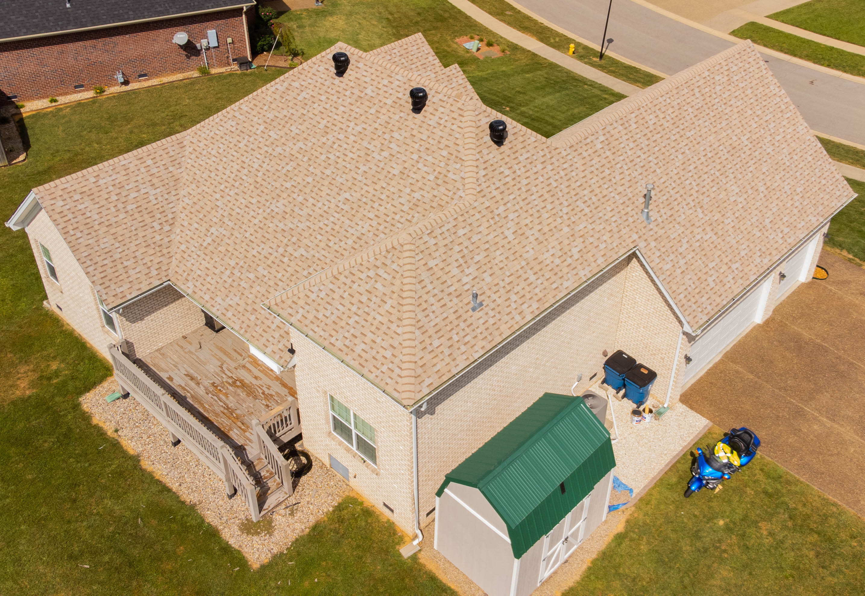 Aerial backside view of full roof installation completed by Roof it Right