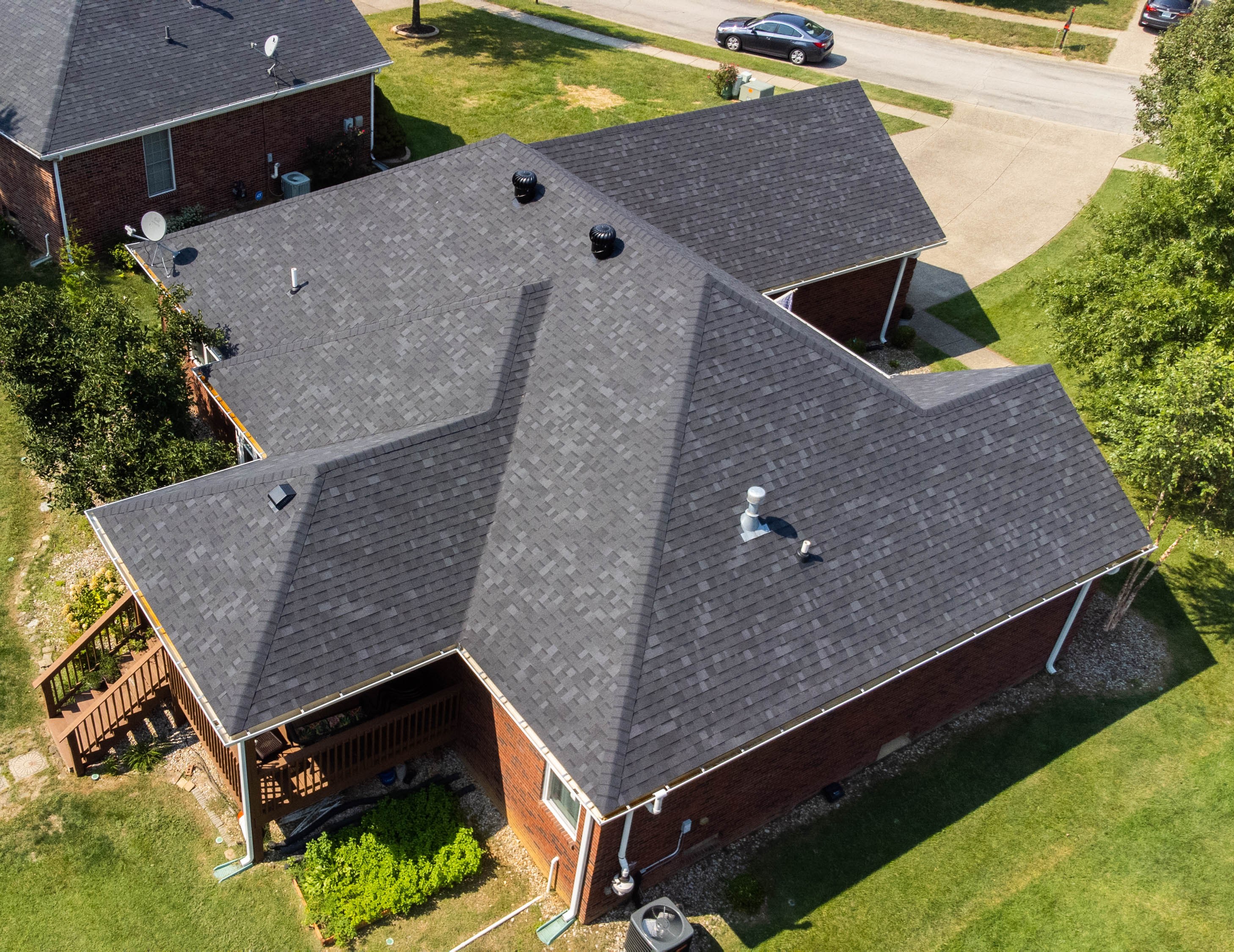 Aerial side view of full roof installation completed by Roof it Right