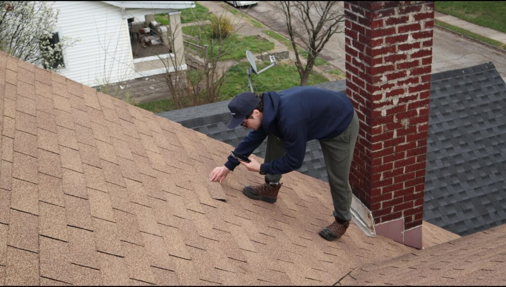 Man inspecting Roof